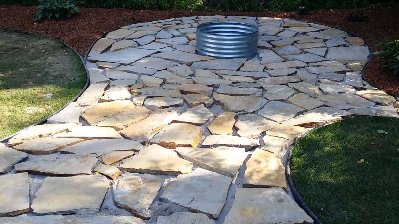 Fire pit / flagstone patio and landscaping almost done ...