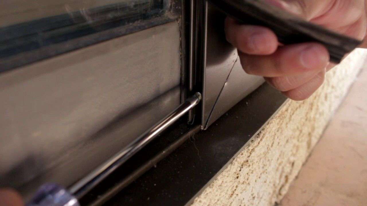 How to Adjust the wheels on a patio sliding screen door ...