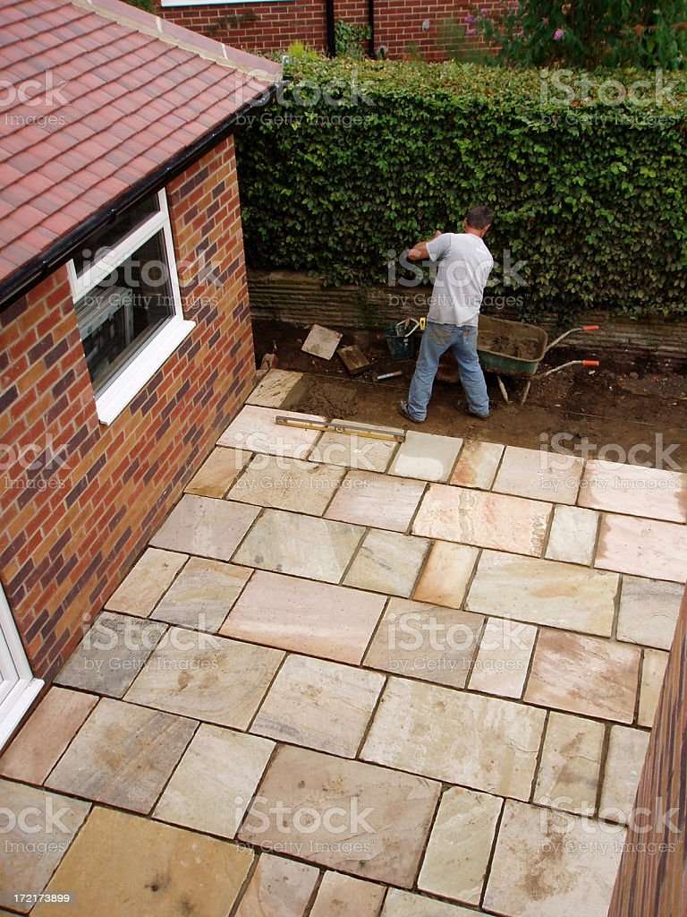 Man Laying Patio Paving Slabs In House Garden Stock Photo ...