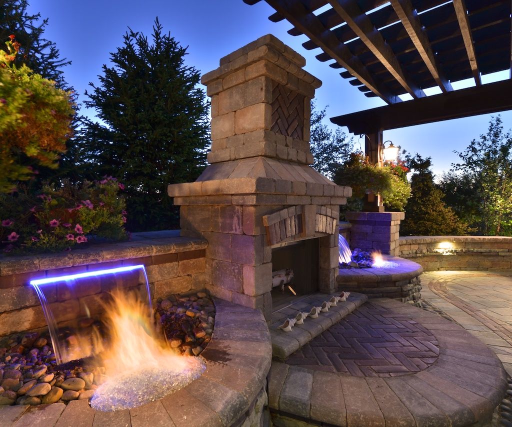 outdoor fireplace with water feature