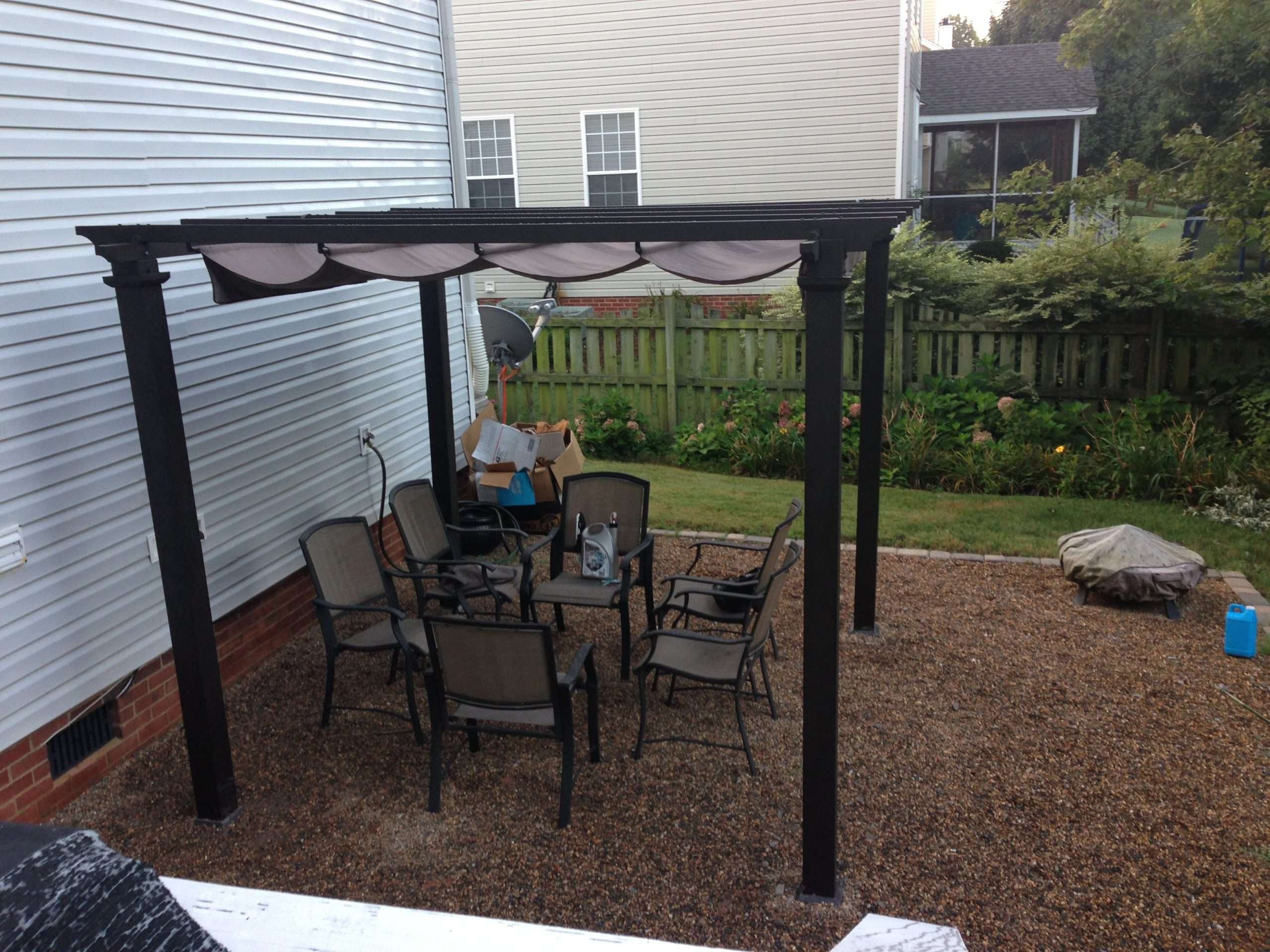 Pergola from Home Depot anchored into concrete pavers ...