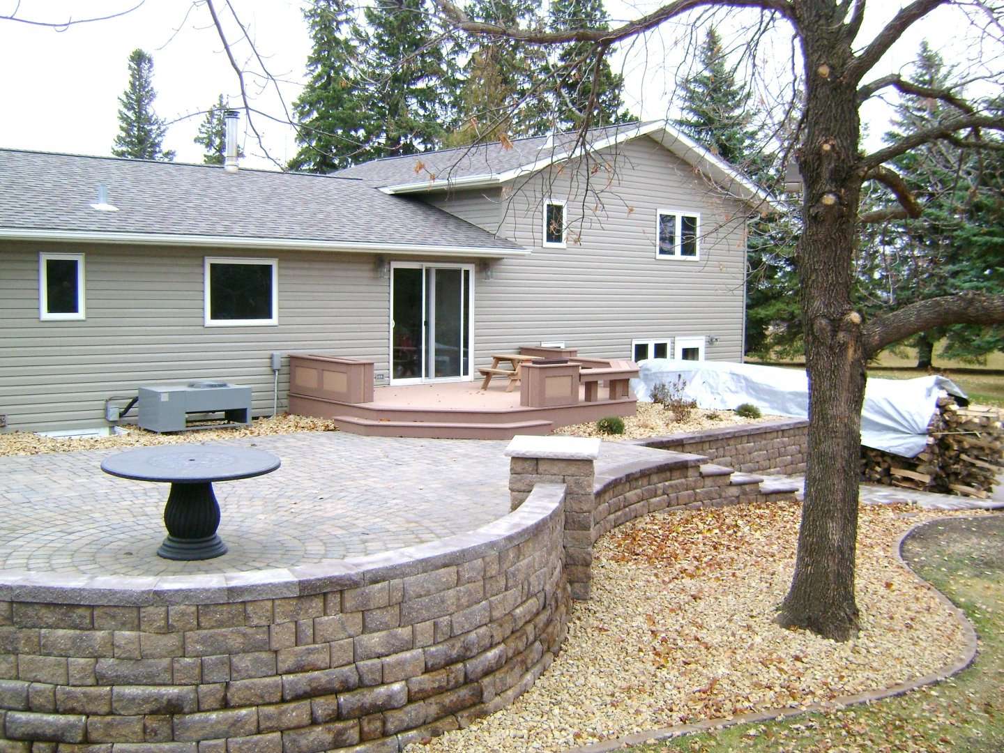 Raised Paver Patio with Retaining Walls, Stairs, Deck, and ...