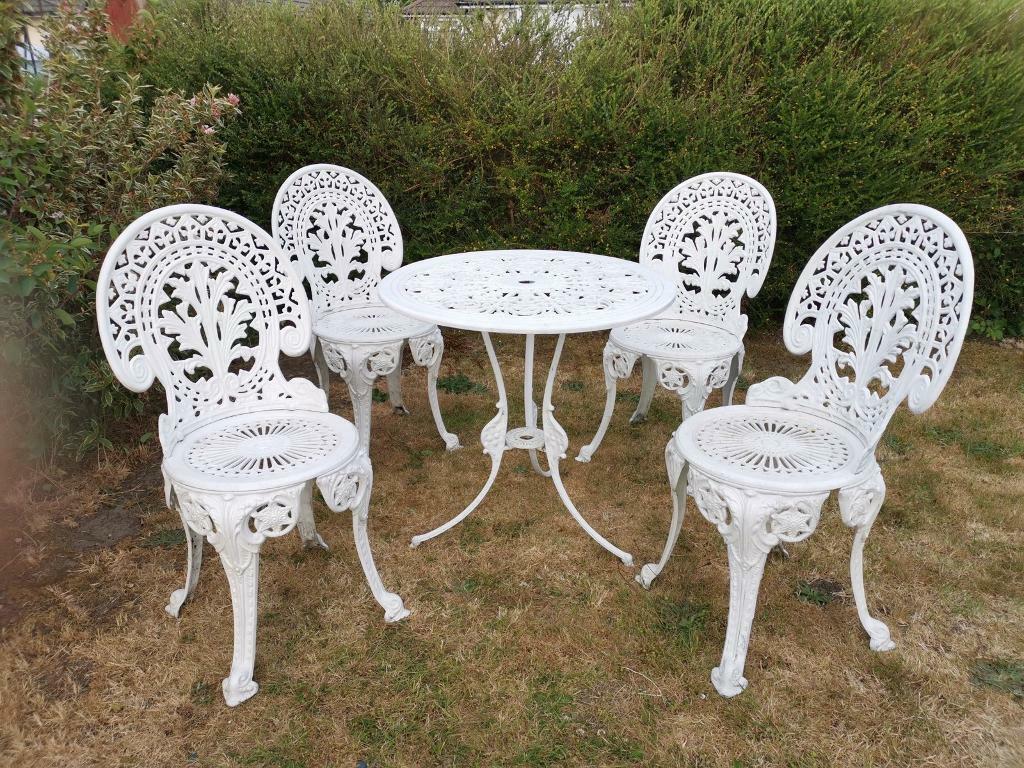 Vintage Cast iron garden table and chairs